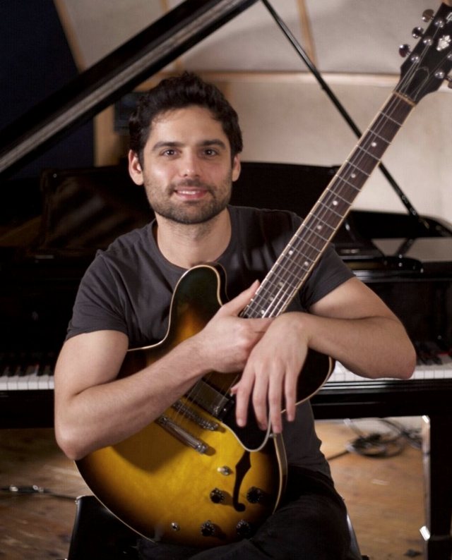 Daniel Weiss with his archtop guitar